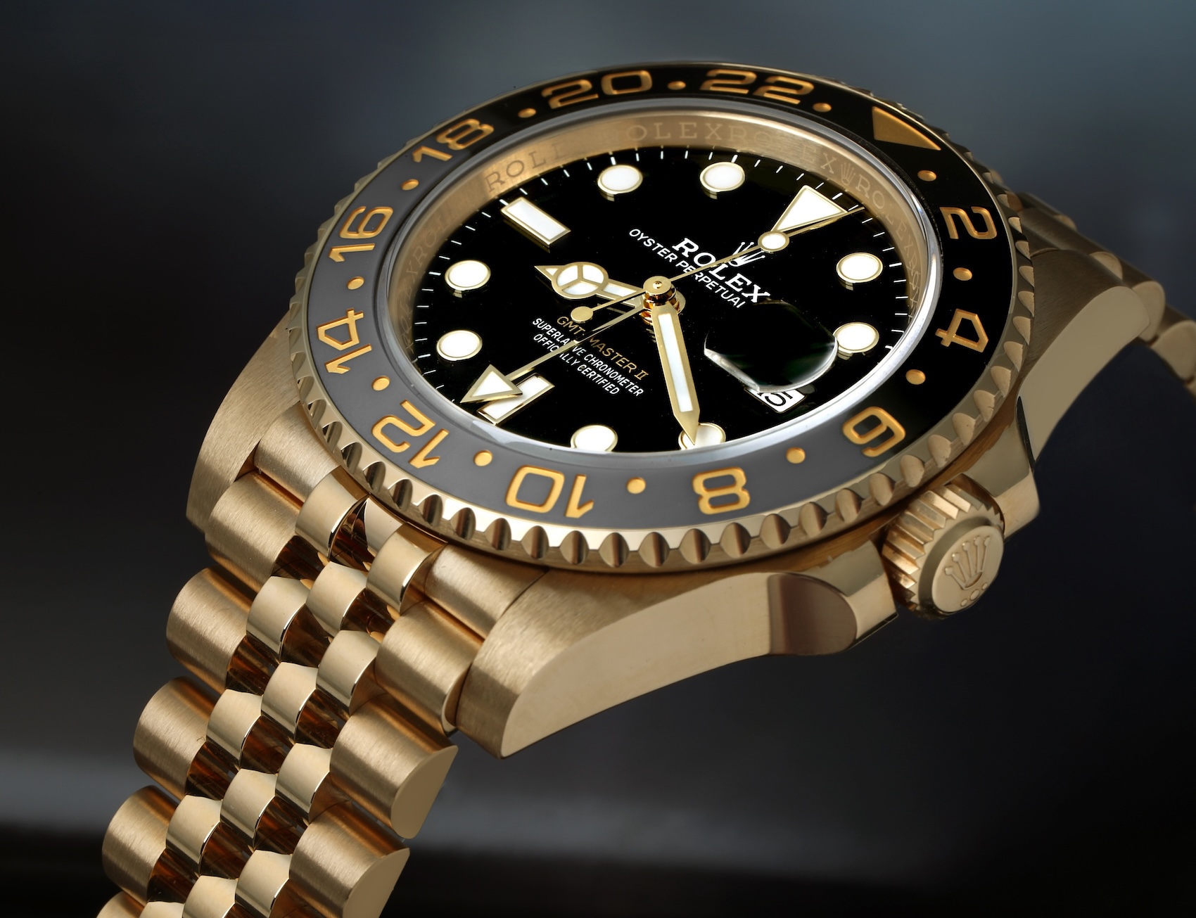 Solid 18k yellow gold Rolex GMT-Master II Zombie Ref 126718GRNR with black and grey Cerachrom bezel and Jubilee bracelet