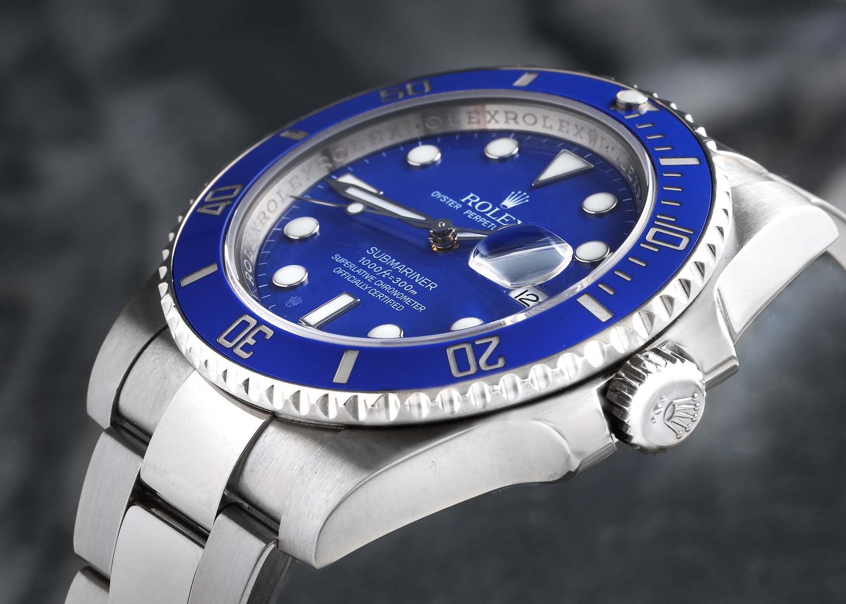 Close-up of the Rolex Submariner Smurf 116619LB showing the 40mm Super Case and blue bezel profile.