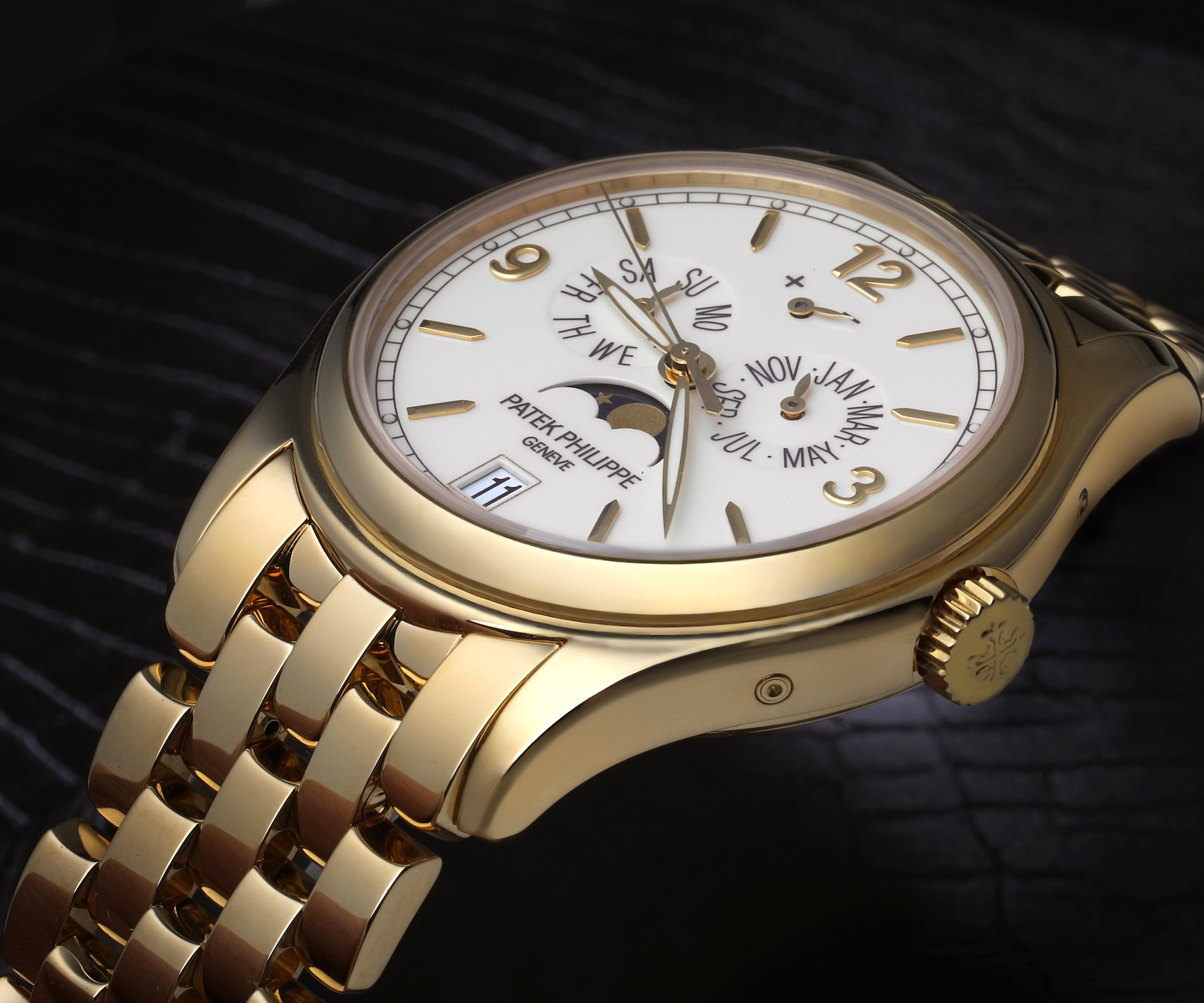 Patek Philippe 5146J showcasing its solid yellow gold bracelet, crown, and rounded 39mm case design.