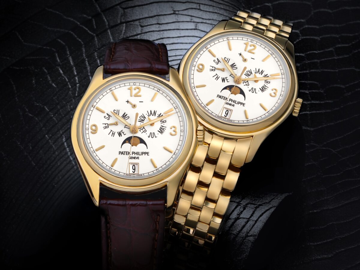 Two Patek Philippe Annual Calendar 5146J watches side-by-side, comparing the brown leather strap with the solid yellow gold multi-link bracelet.
