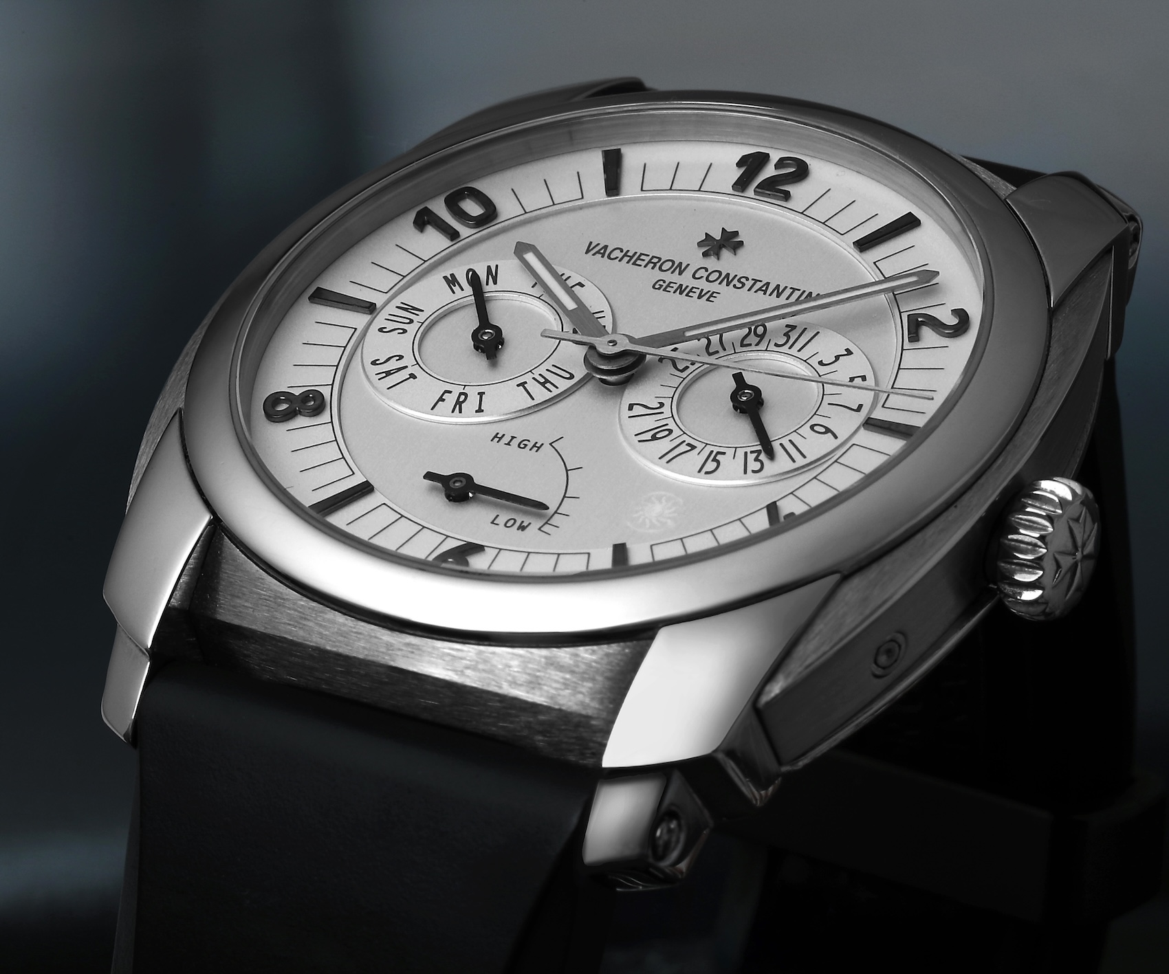 Angled view of the Vacheron Constantin Quai de l'Île Reference 85050 day-date watch in palladium with a light silver dial.