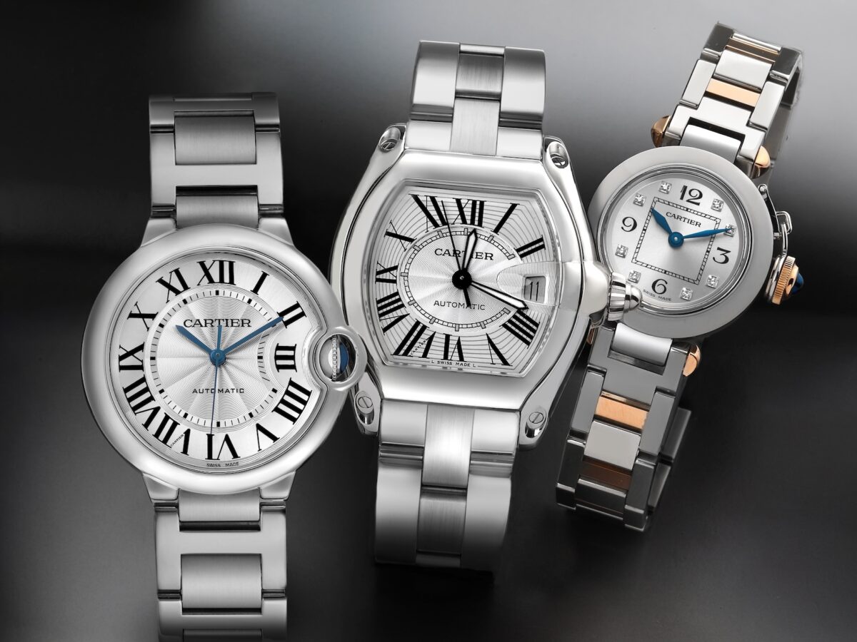 A collection of affordable Cartier watches under 5000 dollars, featuring a stainless steel Ballon Bleu, a tonneau-shaped Roadster, and a two-tone Miss Pasha watch.